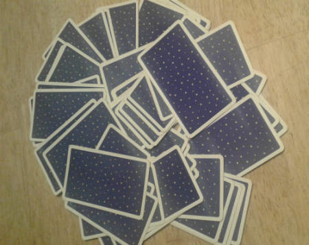 Tarot cards mixed in a mismash.